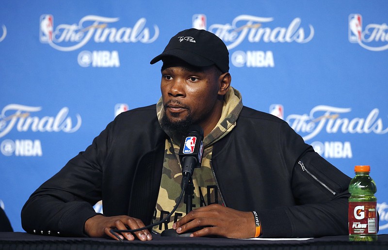 
              Golden State Warriors forward Kevin Durant speaks after Game 3 of basketball's NBA Finals between the Warriors and the Cleveland Cavaliers in Cleveland, early Thursday, June 8, 2017. (AP Photo/Ron Schwane)
            