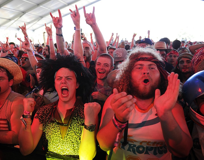  File - Music fans cheer during a Unlocking the Truth concert at Bonnaroo Music and Arts Festival on Thursday, June 11, 2015, in Manchester, Tenn. (Shelley Mays/The Tennessean via AP)