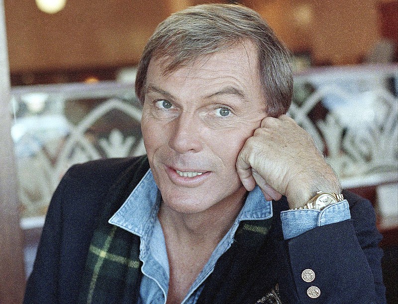 
              FILE - In this Dec. 11, 1985 file photo, Adam West poses for a photo in Los Angeles. On Saturday, June 10, 2017, his family said the actor, who portrayed Batman in a 1960s TV series, has died at age 88. (AP Photo/Lennox McLendon, File)
            
