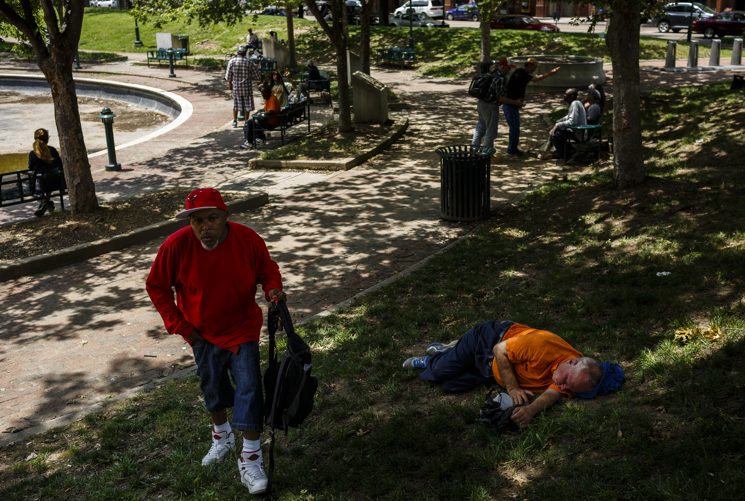 People gather in Miller Park on Friday, June 9, 2017, in Chattanooga, Tenn. The park will be closing for extensive renovations, and some people who spend their days in the park say they are worried about being displaced.
