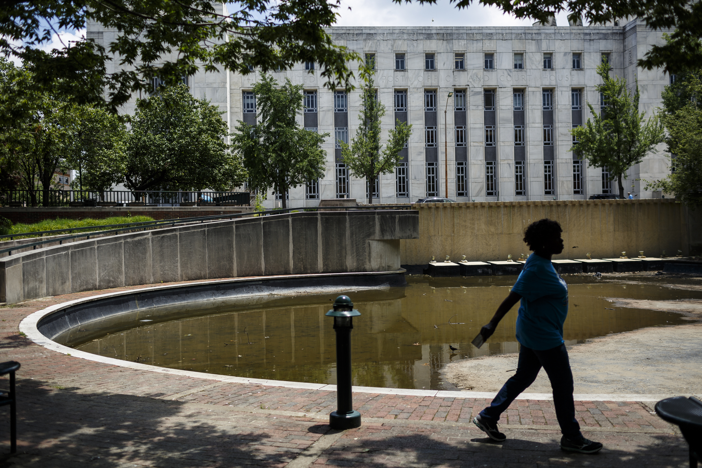 A woman walks in Miller Park on Friday, June 9, 2017, in Chattanooga, Tenn. The park will be closing for extensive renovations.