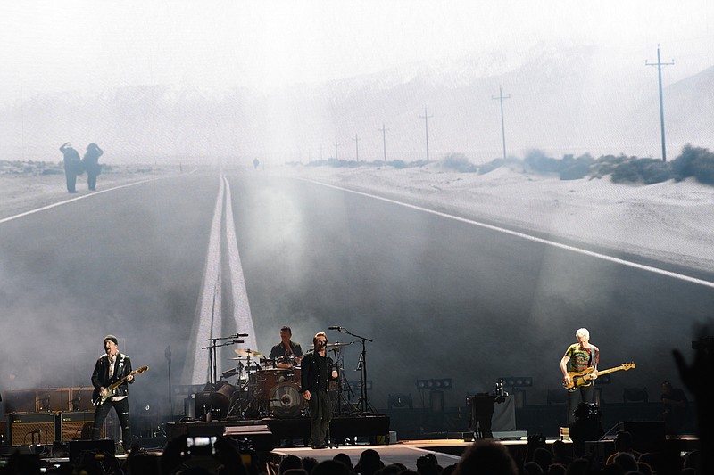 U2, The Edge, drummer Adam Clayton, Bono, performed Friday night at the Bonnaroo Music & Arts Festival.