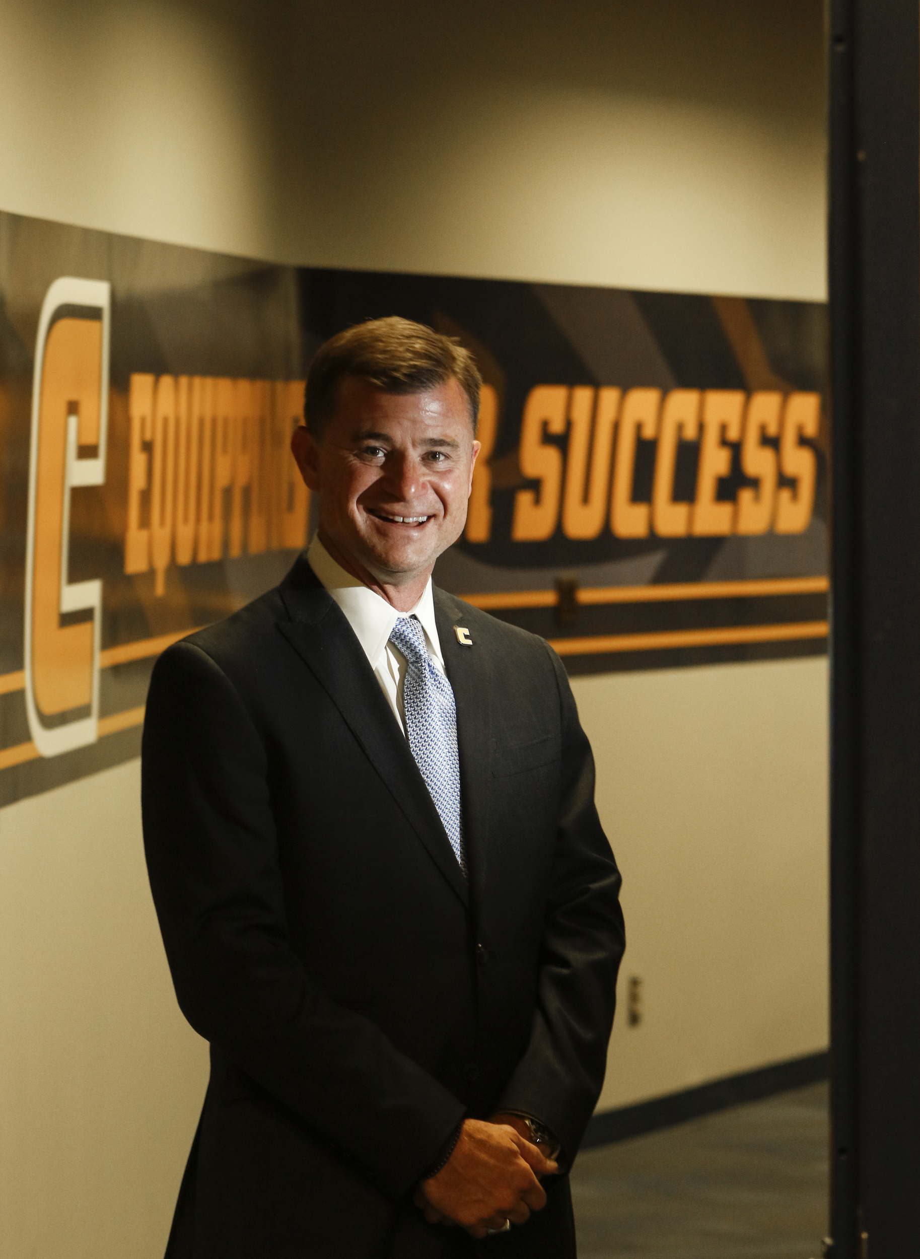 Staff Photo by Dan Henry / The Chattanooga Times Free Press- 7/14/16. David Blackburn, Vice Chancellor and Director of Athletics for The University of Tennessee at Chattanooga, stands in McKenzie Arena where his office is located.