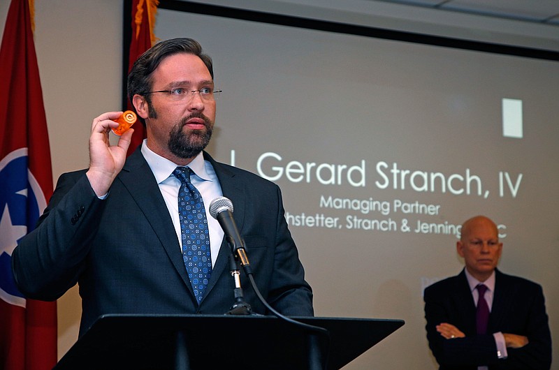 
              CORRECTS DAY TO TUESDAY, NOT WEDNESDAY - In this photo provided by Nigel Kinrade Photography via The Corporate Image, attorney Gerard Stranch speaks on behalf of three Tennessee prosecutors and the guardian of a baby born dependent on opioids that was filed against several drug makers during a news conference on Tuesday, June 13, 2017, in Johnson City, Tenn. The baby survived after spending 14 days in a neonatal intensive care unit, often crying uncontrollably and was given morphine to wean him from his addiction, the suit says. (Nigel Kinrade Photography/The Corporate Image via AP)
            