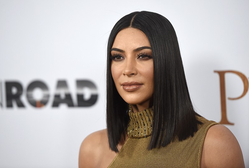 
              FILE - In this April 12, 2017, file photo, Kim Kardashian West arrives at the U.S. premiere of "The Promise" at the TCL Chinese Theatre in Los Angeles.  Kardashian West admits that she's made some mistakes in her life, but the important lesson is not to repeat them. The reality show star was one of the keynote speakers at the annual Forbes Women's Summit, where she spoke of her growing brand and how the robbery in Paris has changed her life. (Photo by Chris Pizzello/Invision/AP, File)
            