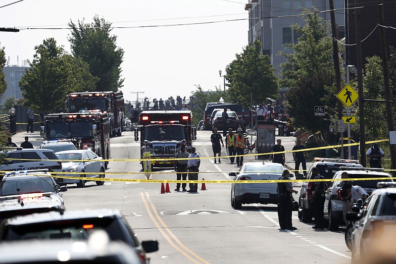 Alexandria, Va. Police and other first responders block East Monroe Ave. in Alexandria, Va., Wednesday, June 14, 2017, after a shooting involving House Majority Whip Steve Scalise of La, at a congressional baseball practice. (AP Photo/Alex Brandon)

