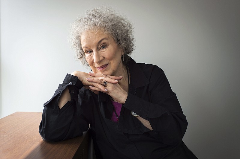 
              FILE - In this July 28, 2016 file photo, author Margaret Atwood sits for a portrait while promoting her new books "Angel Catbird" and "Hag-Seed" in Toronto.  Atwood is receiving a lifetime achievement award from one of the world’s oldest literary organizations.   PEN Center USA announced Wednesday, June 14, 2017,  that  Atwood will be recognized at an Oct. 27 ceremony at the Beverly Hilton Hotel. Actor and writer Nick Offerman is set to host the evening.(Aaron Vincent Elkaim/The Canadian Press via AP)
            