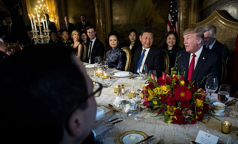 FILE— President Donald Trump and President Xi Jinping of China speak during a dinner at Trump's Mar-a-Lago resort in Palm Beach, Fla., April, 6, 2017. (Doug Mills/The New York Times)