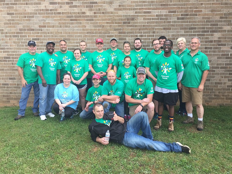Chattanooga Comcast volunteers gather for a group photo to commenorate Comcast Cares Day.