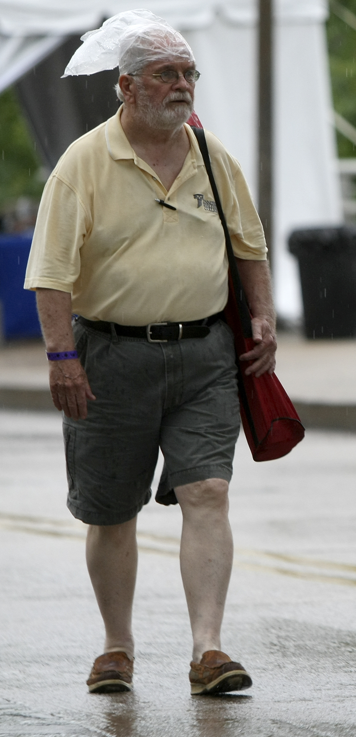 Dick Pelley walks along Riverfront Parkway during the seventh night of the Riverbend Festival at Ross's Landing on Thursday, June 15, in Chattanooga, Tenn. Morris Day and The Time with Cameo headlined the evening.