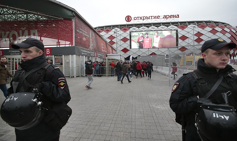 
              In this Wednesday, May 17, 2017 photo Russian police officers guard as fans arrive for a soccer match at Otkrytie Arena, stadium of Spartak Moscow soccer club, where Confederations Cup matches will be played, in Moscow, Russia. Terrorists, hooligans and anti-corruption protesters are among the main concerns for the Russian security forces during the Confederations Cup soccer tournament running from Saturday June 17 until Sunday July 2. (AP Photo/Ivan Sekretarev)
            