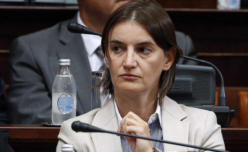 
              FILE- In this Aug. 9, 2016, file photo, Ana Brnabic attends a parliament session in Belgrade, Serbia. Serbia's President Aleksandar Vucic has picked Ana Brnabic as the country's next prime minister, Thursday June, 15, 2017. Brnabic will be the first openly gay prime minister in Serbia's history. (AP Photo/Darko Vojinovic, File)
            