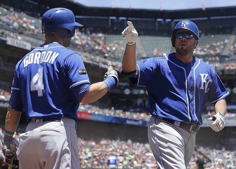 
              Kansas City Royals' Mike Moustakas, right, gestures after hitting a solo home run next to Alex Gordon against the San Francisco Giants during the second inning of a baseball game in San Francisco, Wednesday, June 14, 2017. (AP Photo/Jeff Chiu)
            