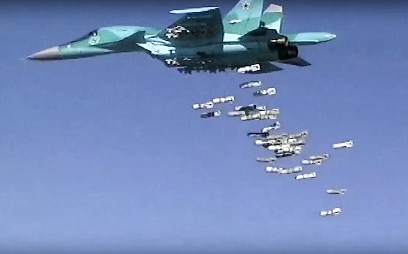 
              FILE - In this file image made from video provided by Russian Defence Ministry press service on Aug. 18, 2016, shows a Russian combat fighter bomber Su-34 unloads its bombs over a target in Syria. The Russian military claims it has killed the leader of the Islamic State group in an airstrike. The ministry said Friday, June 16, 2017, that Abu Bakr al-Baghdadi was killed in a Russian strike in late May along with other senior group commanders. (Russian Defence Ministry Press Service photo via AP, File)
            