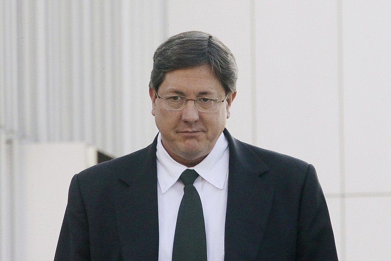 
              FILE - In this Jan. 21, 2015, file photo, polygamous sect leader Lyle Jeffs leaves the federal courthouse, in Salt Lake City. Polygamous sect leader Jeffs has been captured after being on the run for nearly a year. An FBI spokeswoman said Thursday, June 15, 2017, that Jeffs was arrested in South Dakota on Wednesday, June 14. (AP Photo/Rick Bowmer, File)
            