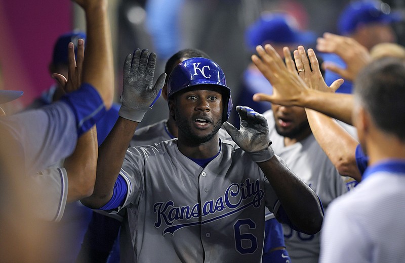 
              Kansas City Royals' Lorenzo Cain is congratulated by teammates after hitting a solo home run during the eighth inning of the team's baseball game against the Los Angeles Angels, Friday, June 16, 2017, in Anaheim, Calif. (AP Photo/Mark J. Terrill)
            