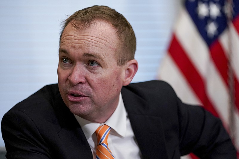 
              FILE - In this May 25, 2017 file photo, Budget Director Mick Mulvaney speaks during a meeting in the Eisenhower Executive Office Building on the White House complex in Washington.  Voters in South Carolina's 5th Congressional District choose between a Republican (Ralph Norman) backing the Trump administration and a Democrat (Archie Parnell) who claims to be best aligned with district voters to replace Mulvaney. The district was a Democratic stronghold for a century before a tea party wave swept Mulvaney into office in 2010.   (AP Photo/Andrew Harnik)
            