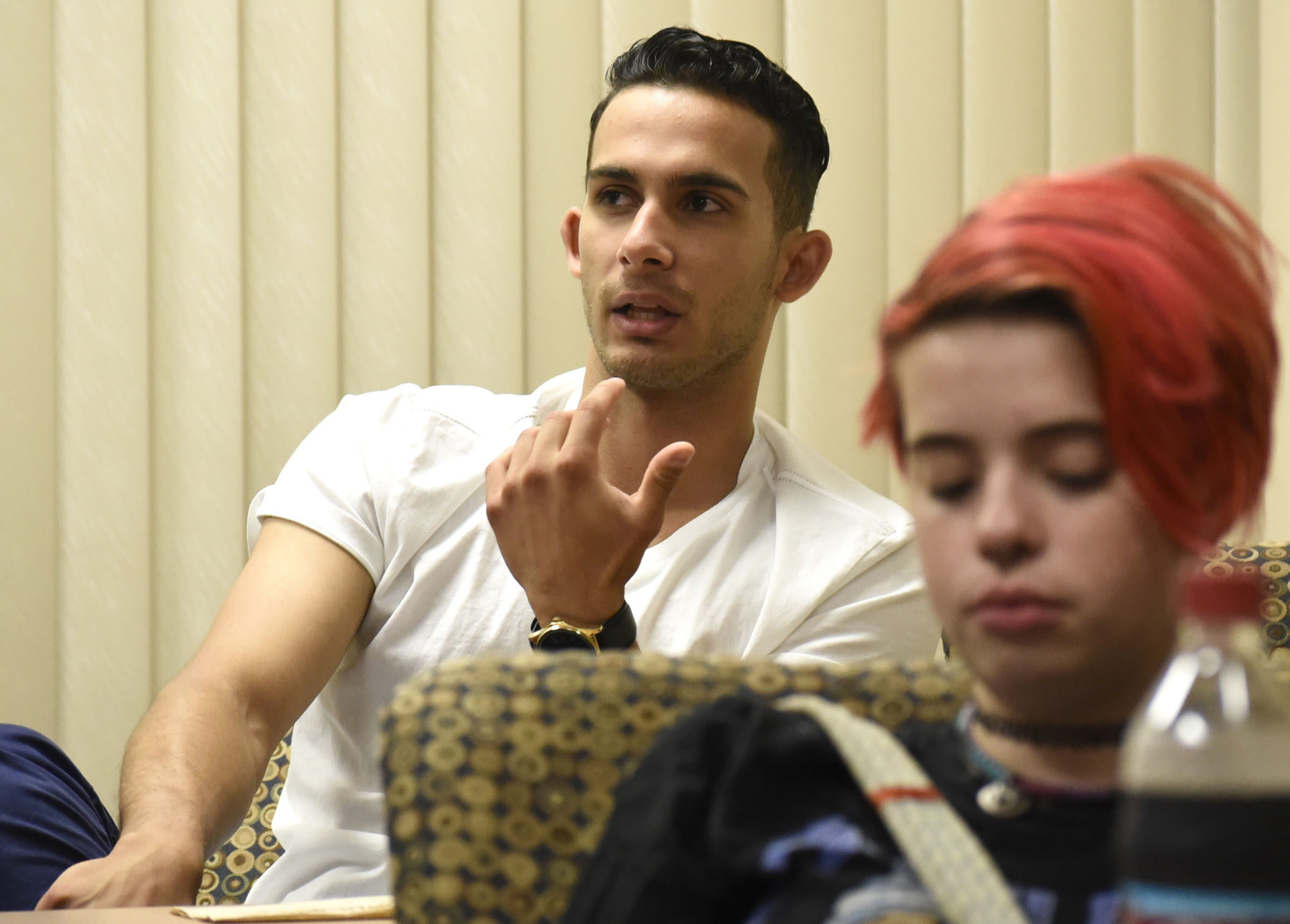Lucas Gallon talks about her experiences with the Global Scholars program, while fellow scholar Holly Hess listens. The Chattanooga Times Free Press interviewed some of Chattanooga State Community College's Global Scholars about their recent trip to Greece to work with Syrian refugees on June 13, 2017.