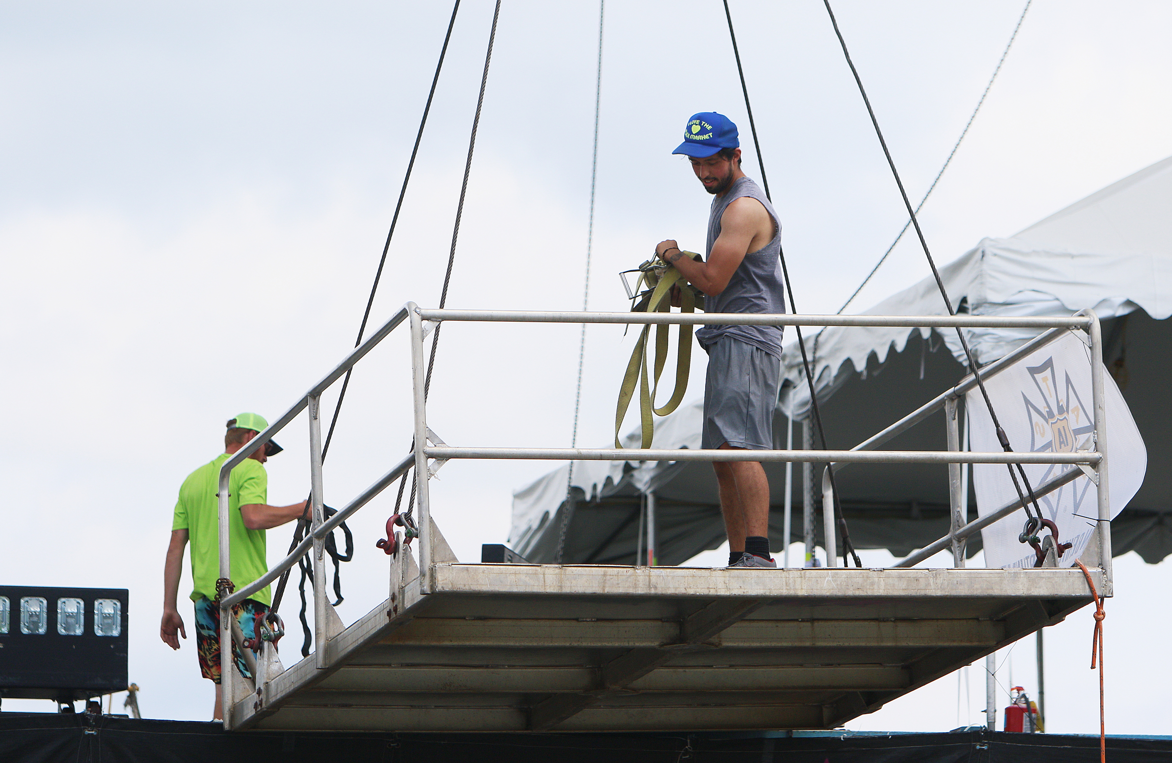 Emanuel Clark, a member of the International Alliance of Theatrical Stage Employees local 140, gets a platform ready to unload lighting equipment from the Coke Stage at Ross's Landing in Chattanooga, Tenn., Sunday, June 18, 2017. After more than a week of performances, Riverbend Festival 2017 is over.