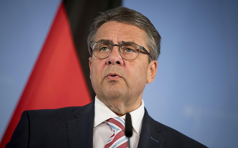 
              In this Wednesday June 14, 2017 photo German Foreign Minister Sigmar Gabriel speaks during a press conference at the ministry of foreign affairs in Berlin, Germany. Gabriel and Austria's Chancellor Christian Kern have voiced sharp criticism of the latest U.S. sanctions against Moscow, Thursday, June 15, 2017, because they could affect European businesses involved in piping Russian natural gas to Europe. (Kay Nietfeld/dpa via AP)
            