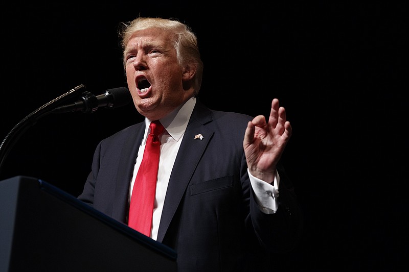 
              FILE - In this Friday, June 16, 2017, file photo President Donald Trump speaks about Cuba policy in Miami. The Trump Organization dissolved subsidiaries created to pursue business opportunities in Qatar six days after Donald Trump was inaugurated as America’s 45th president. (AP Photo/Evan Vucci, File)
            