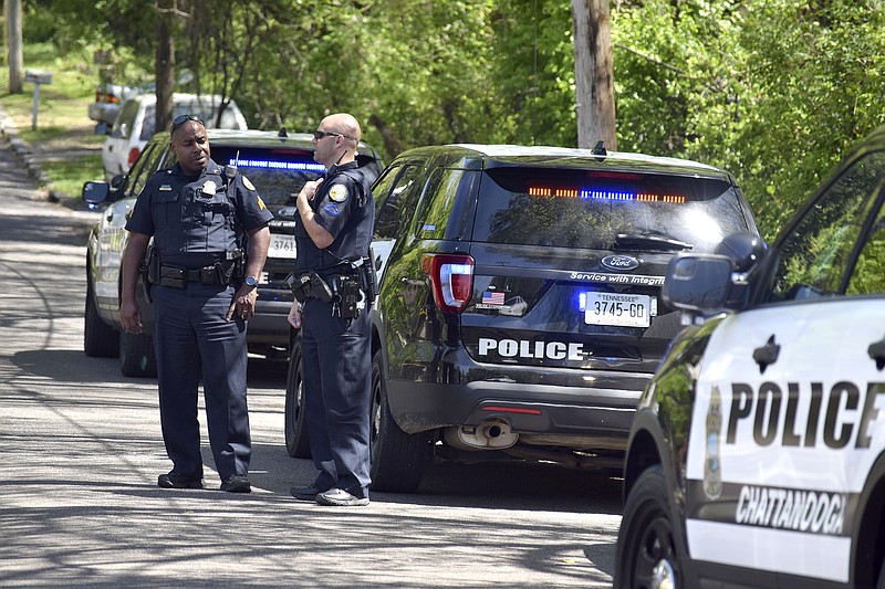 Chattanooga Police officers investigate an accidental shooting downtown on April 9, 2017. Police officials hope to keep overall crime low by increasing police presence in problem areas. (Staff photo by Robin Rudd)