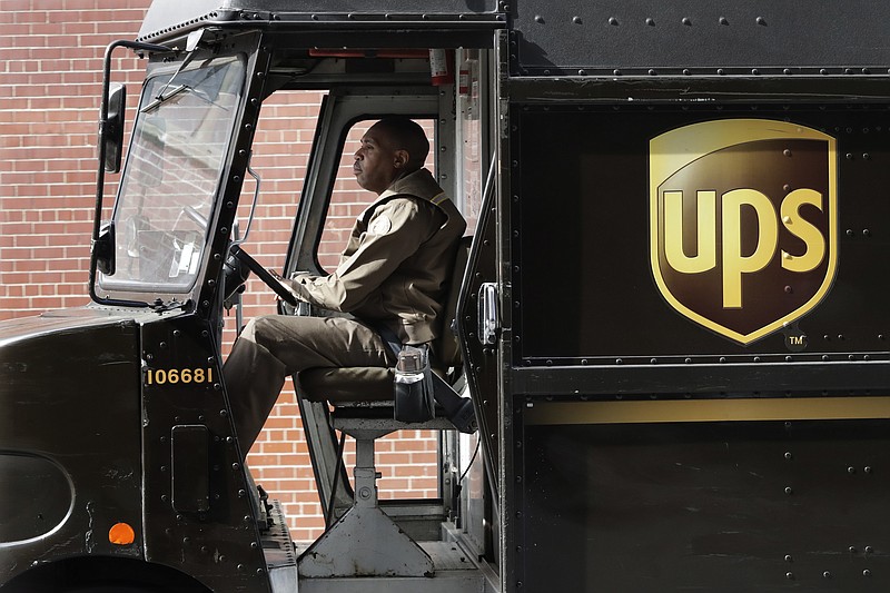 
              In this Tuesday, May 9, 2017, photo, a UPS driver takes his truck on a delivery route, in New York. UPS is adding a new charge of under $1 for shipments to residential customers during peak delivery periods in November and December. On Monday, June 19, 2017, United Parcel Service Inc. said it will add 27 cents for residential deliveries from Nov. 19 to Dec. 2 and Dec. 17-23. UPS will add a fee of between 81 cents and 97 cents to overnight, second- or third-day deliveries for residential deliveries Dec. 17-23. (AP Photo/Mark Lennihan)
            