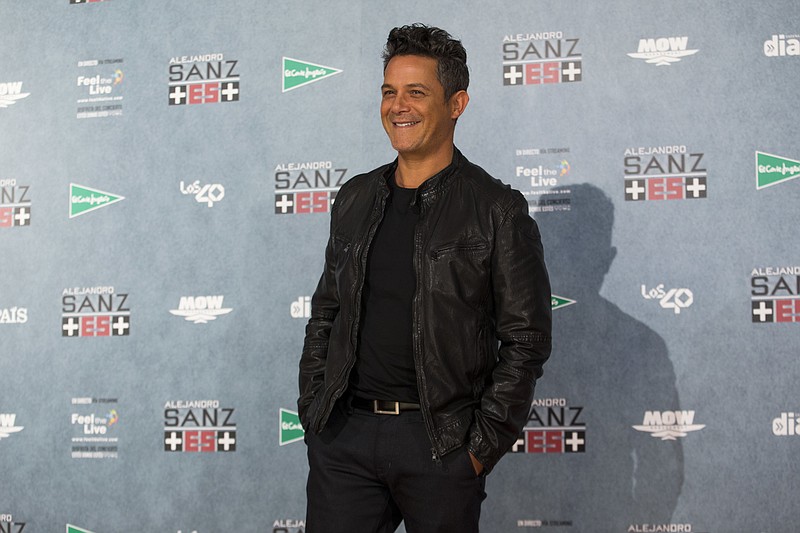 
              FILE - In a Wednesday, May 17, 2017 file photo, Spanish singer Alejandro Sanz poses for the media during a photo call at the Vicente Calderon stadium in Madrid. Sanz has been named 2017 Latin Recording Academy Person of the Year. The academy will honor the 18-time Latin Grammy Award winner and three-time Grammy Award winner on Nov. 15 at the Mandalay Bay Convention Center in Las Vegas, on the eve of the Latin Grammys.  (AP Photo/Francisco Seco, File)
            