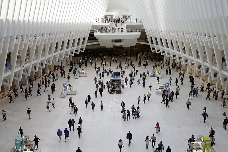 
              In this Thursday, June 15, 2017, photo, people walk inside the Oculus, the new transit station at the World Trade Center in New York. Researchers are gearing up to start recruiting 10,000 New Yorkers early next year for a study so sweeping it’s called “The Human Project.” They’ll be asked to share a trove of personal information, from cellphone locations and credit-card swipes to blood samples and life-changing events. For 20 years. The idea is to channel different data streams into a river of insight on health, aging, education and many other aspects of human life. (AP Photo/Frank Franklin II)
            