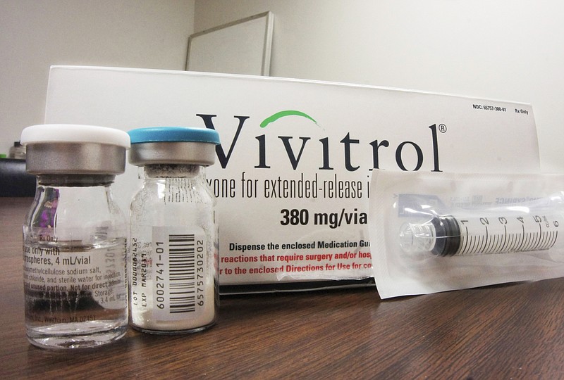 
              FILE - This Oct. 19, 2016, file photo shows the packaging of Vivitrol at an addiction treatment center in Joliet, Ill. A new study finds only 1 in 4 teens and young adults with opioid addiction receive recommended treatment medication despite having good health insurance. The research suggests that doctors are not keeping up with the needs of youth in the opioid addiction epidemic. The study was published Monday, June 19, 2017, in JAMA Pediatrics. (AP Photo/Carla K. Johnson, File)
            