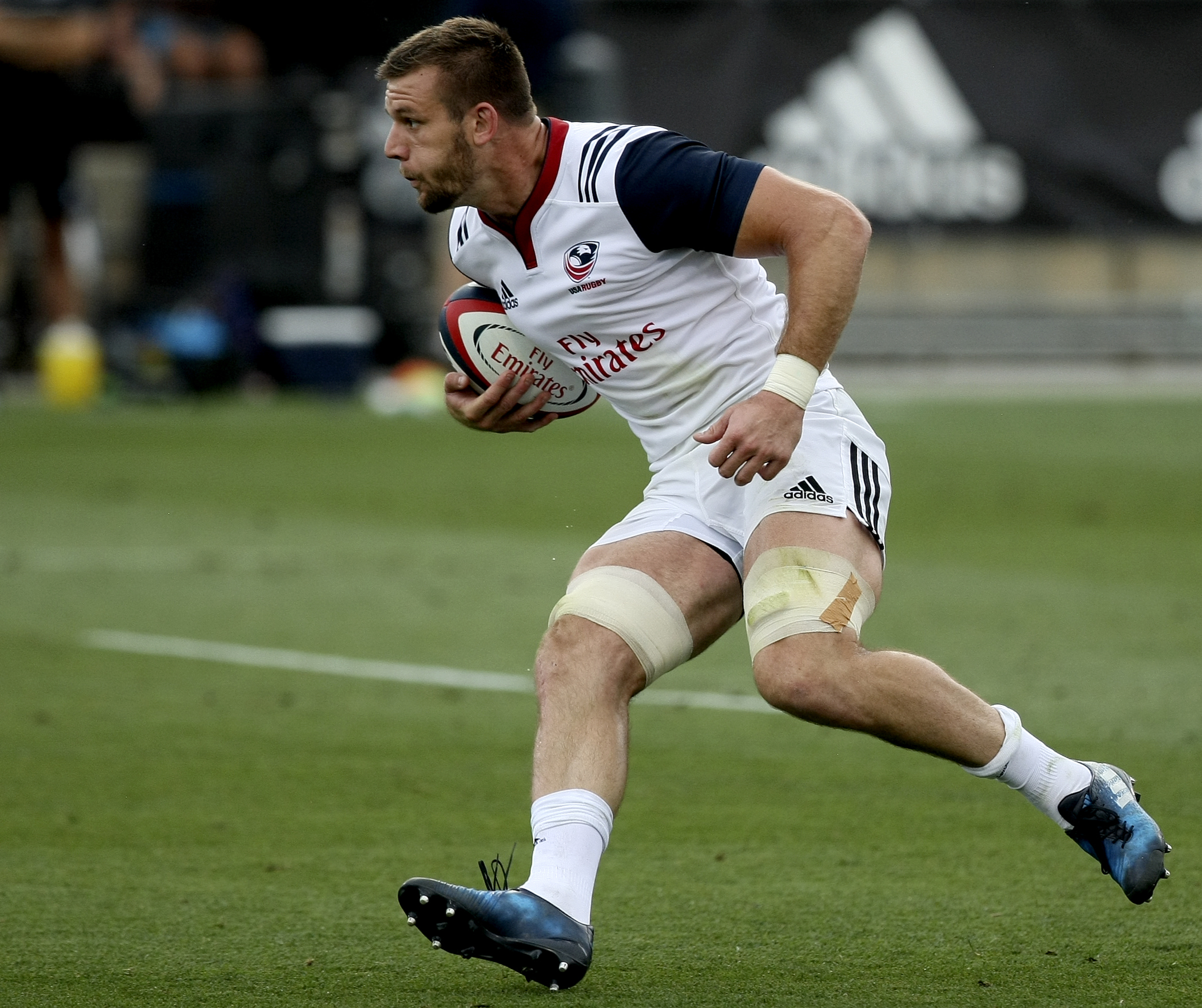 USA's Cam Dolan carries the ball against Georgia during an international rugby test match at Kennesaw State University's Fifth Third Bank Stadium on Saturday, June 17, in Kennesaw, Ga.