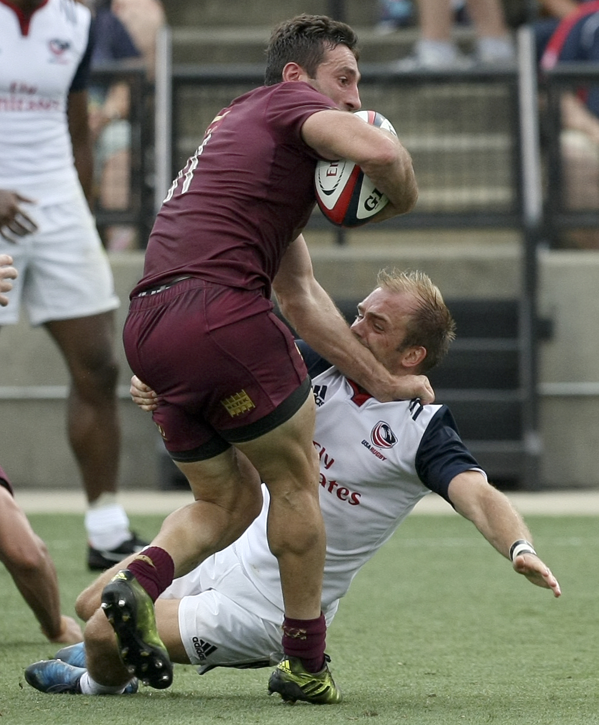 Georgia's Sandro Todua (11) runs through a tackle attempt by USA's Shaun Davies during an international rugby test match at Kennesaw State University's Fifth Third Bank Stadium on Saturday, June 17, in Kennesaw, Ga.