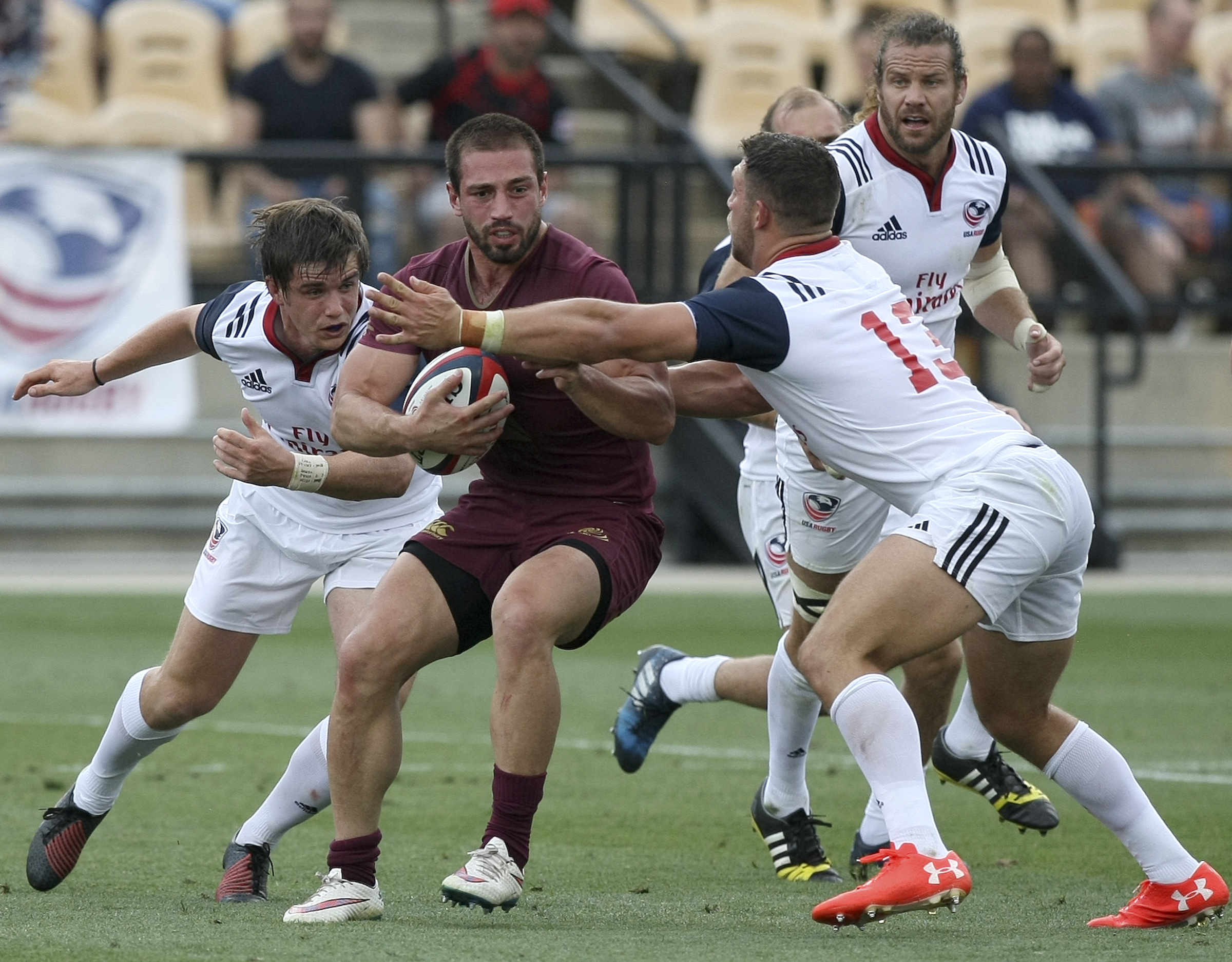 USA's Bryce Campbell (13) tackles Georgia captain Merab Sharikadze after he spun out of a tackle from USA's AJ MacGinty, left, during an international rugby test match at Kennesaw State University's Fifth Third Bank Stadium on Saturday, June 17, in Kennesaw, Ga.