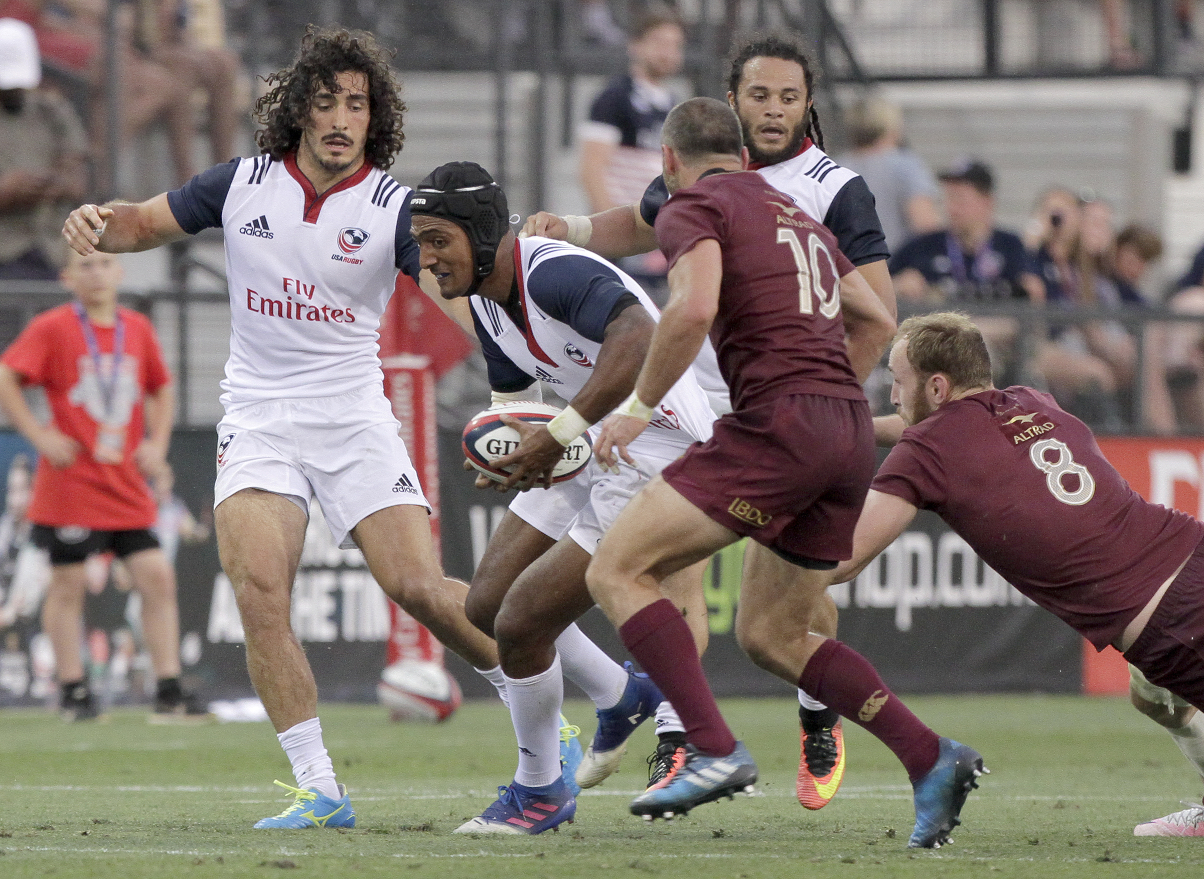 USA's Marcel Brache (22) carries the ball against Georgia during an international rugby test match at Kennesaw State University's Fifth Third Bank Stadium on Saturday, June 17, in Kennesaw, Ga.