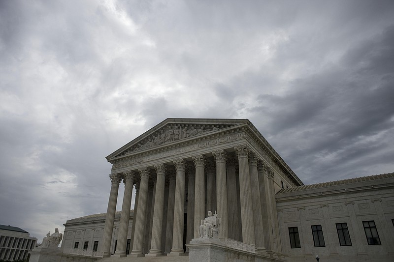 FILE — The U.S. Supreme Court building in Washington this spring. The court announced on Monday, that it would consider whether partisan gerrymandering violates the Constitution. In the past, the court has struck down election maps as racial gerrymanders that disadvantaged minority voters, but it has never disallowed a map on the ground that it was drawn to give an unfair advantage to a political party. (Gabriella Demczuk for The New York Times)