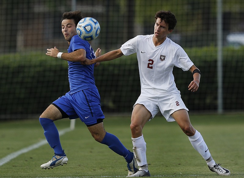 The ball collides with McCallie's Drew Viscomi, left, near MBA's Cole Deal during their TSSAA Division II-AA state soccer tournament championship match against MBA on Thursday, May 25, 2017, in Murfreesboro, Tenn. McCallie won 3-2 to seal the championship.