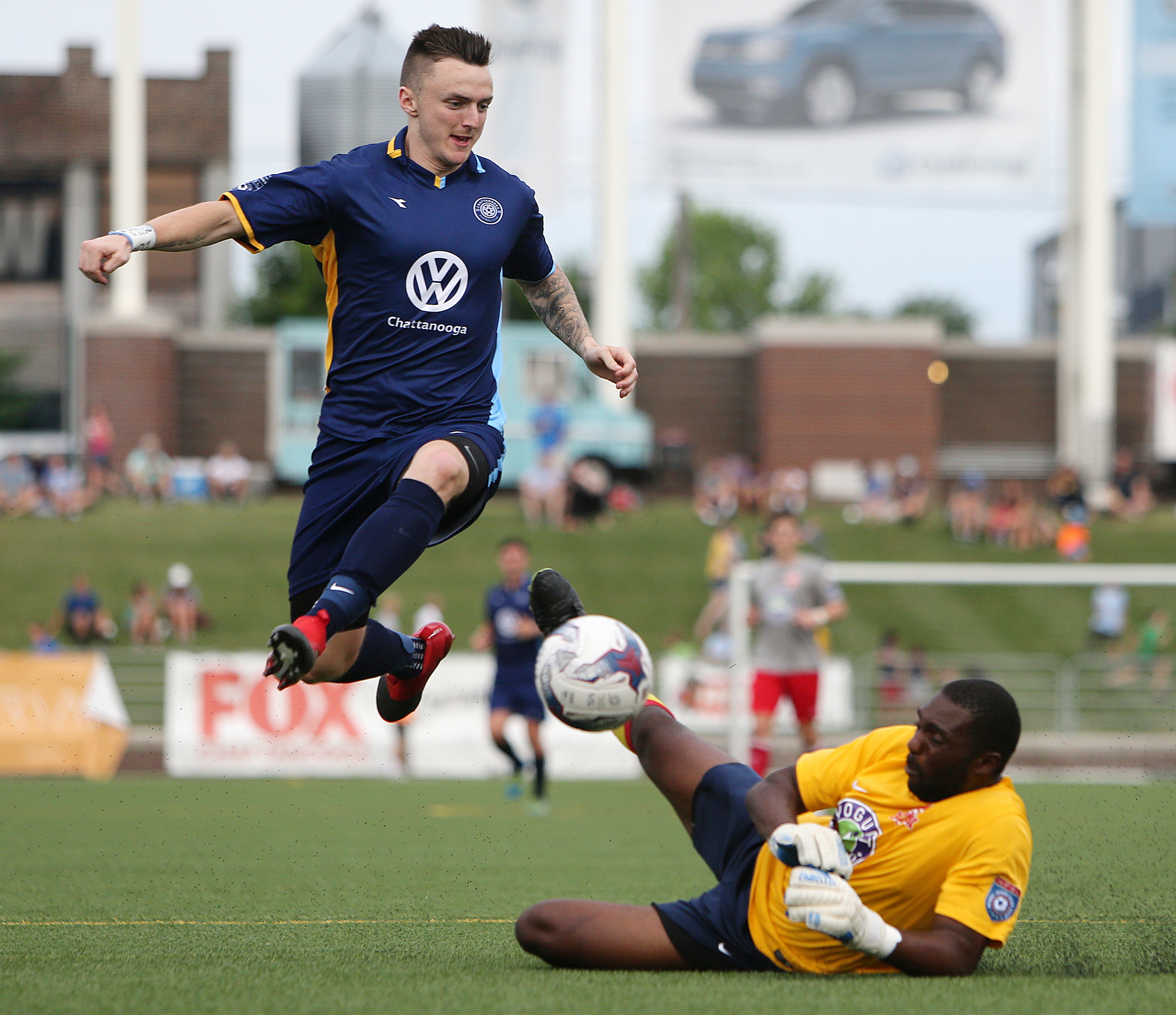 Chattanooga Football Club's Jon Finlay (12) attempts to score a goal on Birmingham Hammers goalie Prichard Ndaira (13) Tuesday, June 20, 2017, at Finley Stadium in Chattanooga, Tenn. CFC won 5-0.