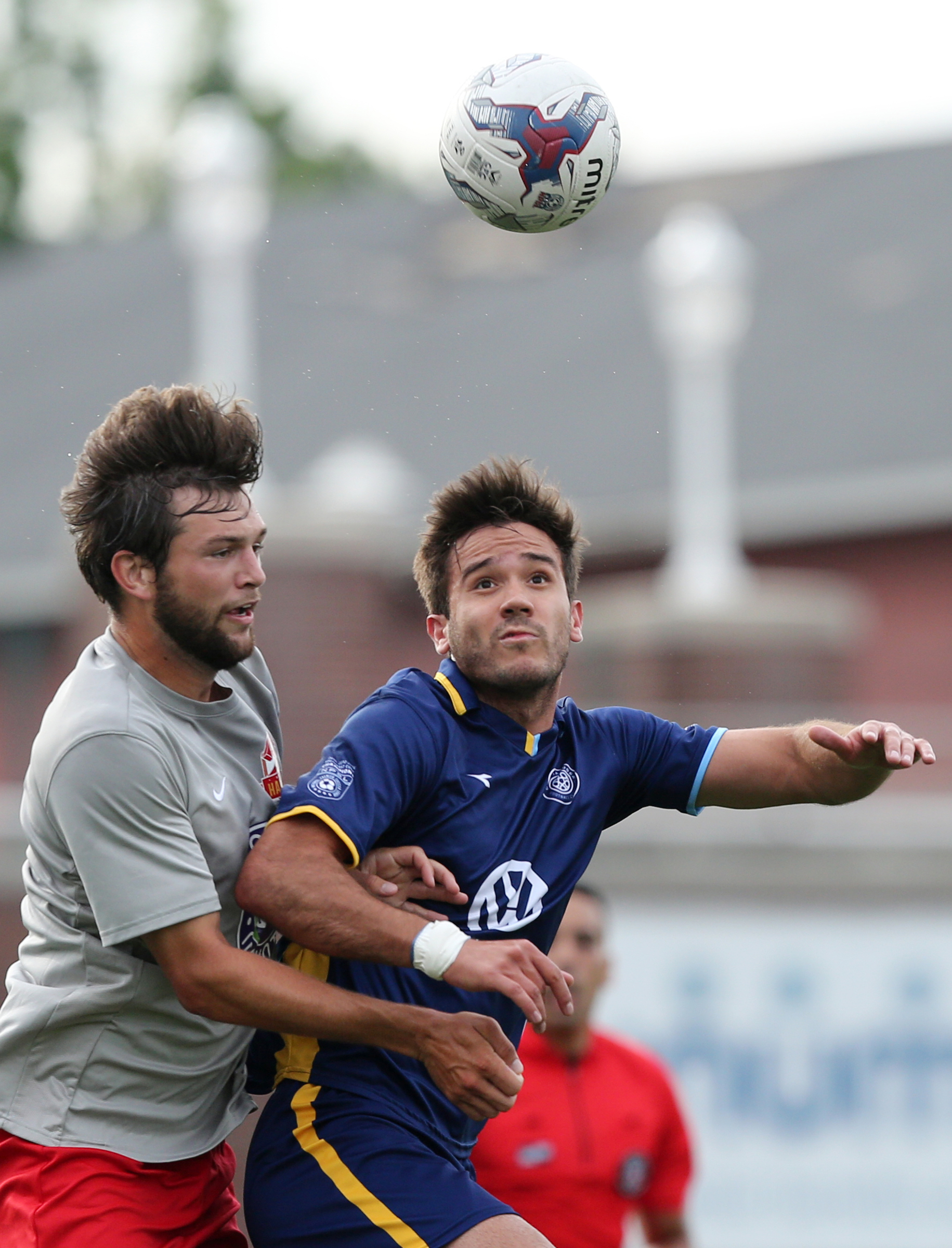 Birmingham Hammers' Robert Stroupe (28) and Chattanooga Football Club's Jose Francisco Ferraz (9) go up for a header Tuesday, June 20, 2017, at Finley Stadium in Chattanooga, Tenn. CFC won 5-0.