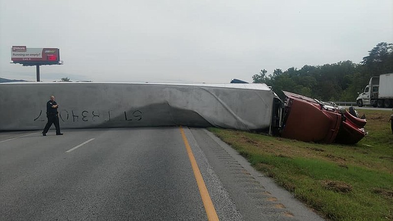 A semi truck overturned Tuesday afternoon on Interstate 59 northbound just before the Trenton, Ga., exit. (Courtesy of Trenton-Dade County Fire Facebook page)