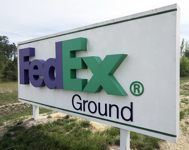 
              This Tuesday, April 18, 2017, photo shows a FedEx Ground sign at a warehouse in Ashland, Va. FedEx Corp. reports earnings, Tuesday, June 20, 2017. (AP Photo/Steve Helber)
            