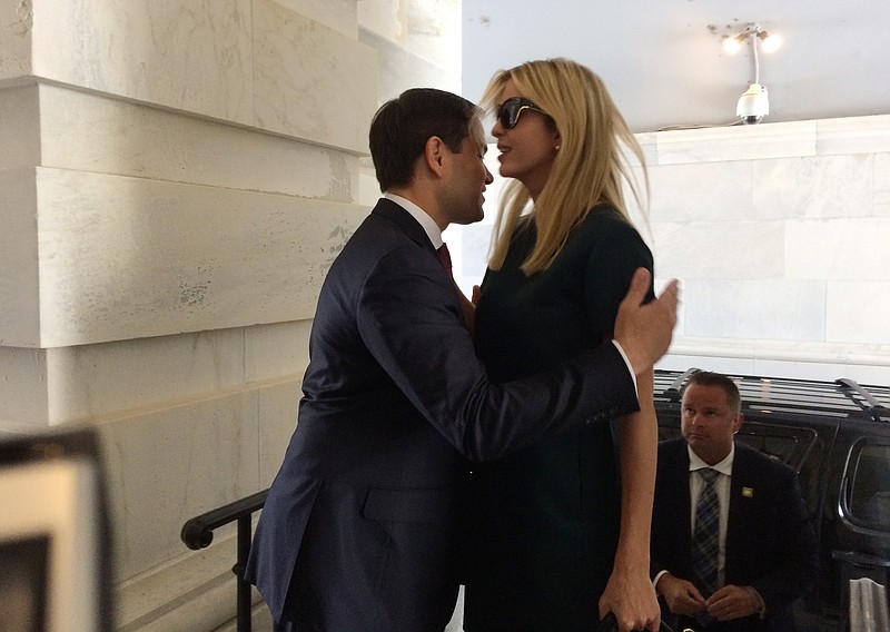 
              Ivanka Trump, daughter of President Donald Trump, is greeted by Sen. Marco Rubio, R-Fla., as she arrives at the Capitol to meet with lawmakers about parental leave, in Washington, Tuesday, June 20, 2017. (AP Photo/Erica Werner)
            