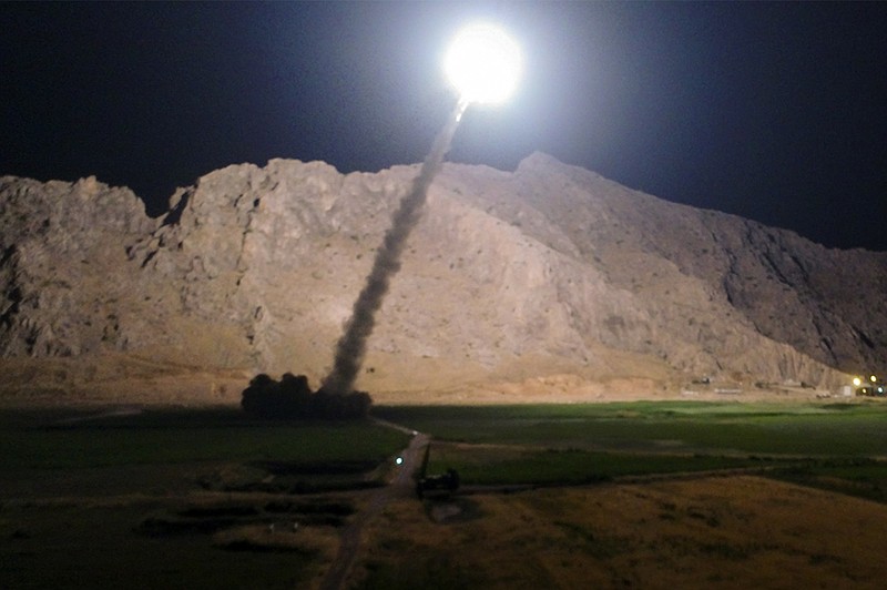 
              In this picture released by the Iranian state-run IRIB News Agency on Monday, June 19, 2017, a missile is fired from city of Kermanshah in western Iran targeting the Islamic State group in Syria. Iran's powerful Revolutionary Guard, a paramilitary force in charge of the country's missile program, said it launched six Zolfaghar ballistic missiles from the western provinces of Kermanshah and Kurdistan. (IRIB News Agency, Morteza Fakhrinejad via AP)
            