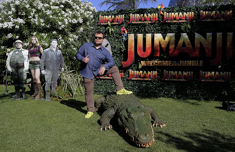
              Actor Jack Black gestures as he poses to the media during a photocall to promote the film "Jumanji: Welcome to the jungle" in Barcelona, Spain, Sunday, June 18, 2017. (AP Photo/Manu Fernandez)
            