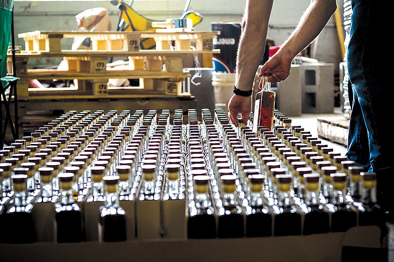 Bottles are packaged at Bluegrass Distillers.