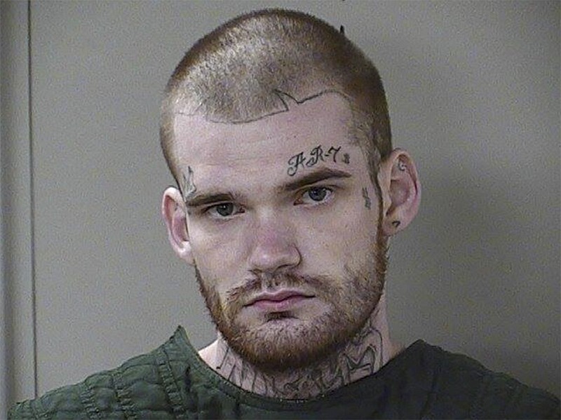 
              In this June 15, 2017 photo released by the Rutherford County Sheriff's Office, escaped Georgia inmate Ricky Dubose poses for a booking photo in Tenn. The end of the road for the two inmates, Dubose, and Donnie Russell Rowe sought in the killings of their guards on a Georgia prison bus turned out to be the driveway of a homeowner in rural Tennessee, who held them at gunpoint, June 15, 2017, until reinforcements arrived. (Rutherford County Sheriff's Office via AP)
            
