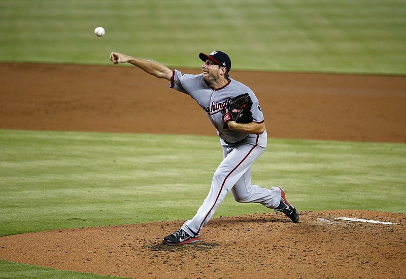 
              Washington Nationals' Max Scherzer delivers a pitch during the third inning of a baseball game against the Miami Marlins, Wednesday, June 21, 2017, in Miami. (AP Photo/Wilfredo Lee)
            