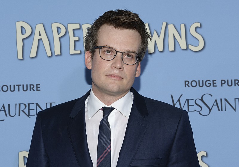 
              FILE - In this July 21, 2015, file photo, author John Green attends the premiere of "Paper Towns" in New York. The author of the million-selling “The Fault in Our Stars” has a new novel coming Oct. 10, Dutton Books announced Thursday, June 22, 2017. The book is called “Turtles All the Way Down” and tells of a 16-year girl in search of a missing billionaire as she struggles with mental illness.  (Photo by Evan Agostini/Invision/AP, File)
            