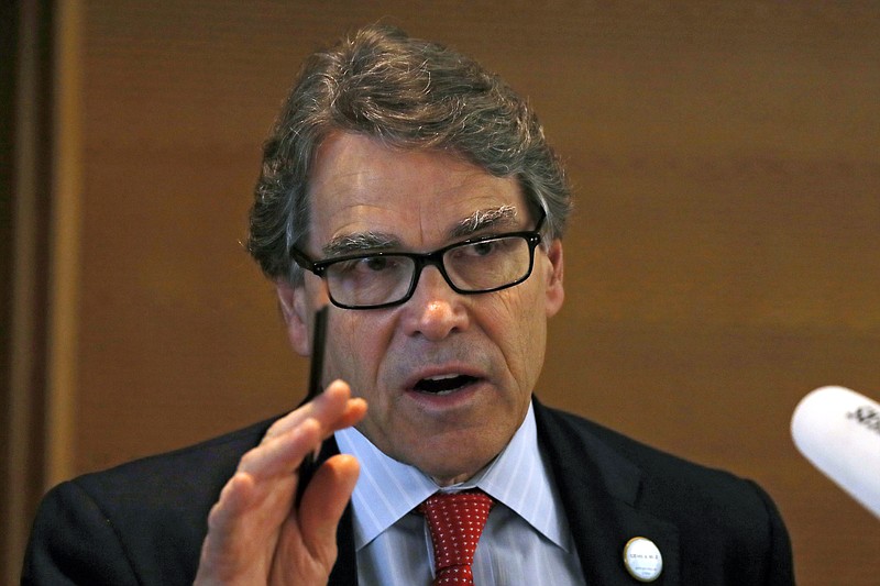 
              FILE - In this June 6, 2017, file photo, U.S. Energy Secretary Rick Perry speaks during the carbon capture, utilization and storage event, on the sidelines of the clean energy conference held at the China National Convention Center in Beijing. Republicans and Democrats are denouncing President Donald Trump’s proposed energy budget, and even Perry is distancing himself from the plan.  As senators condemned the budget at a hearing June 22, Perry made it clear he did not have a say on the request submitted to Congress. Perry told the Senate energy panel that the $28 billon proposal “was written before I got here,’’ adding: “My job is to defend it.’’  (AP Photo/Andy Wong, File)
            