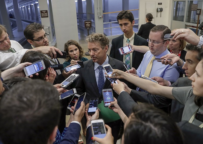 Sen. Rand Paul, R-Ky., speaks to reporters at the United States Capitol on Thursday after Republicans released their long-awaited health care bill.