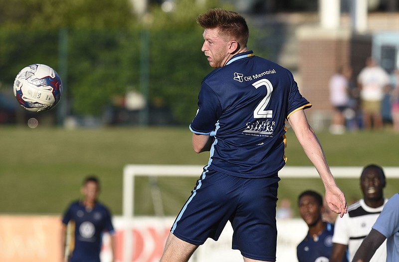 Danny Whitehall directs a header downfield for the Chattanooga Football Club against the visiting Inter Nashville FC last Saturday night at Finley Stadium. CFC won that game with a late goal and erupted for a 5-0 win Tuesday against Birmingham.